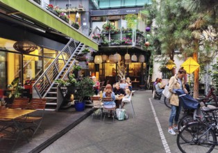 Green backyard with a restaurant in Kreuzberg, Berlin-Kreuzberg, Germany