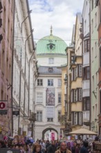 Hofgasse with Hofburg Imperial Palace, historic houses and many people, old town, Innsbruck, Tyrol,