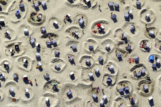 Sandy beach beach with beach chairs and sand walls, sand castles, aerial view, Wangerooge, North
