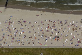 Sandy beach beach with beach chairs and sand walls, sand castles, aerial view, Wangerooge, North