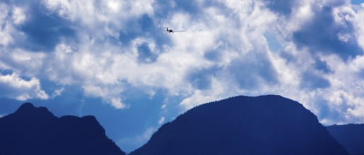 Motorised glider flying over the Alps, Salzburg, Alps, Austria, Europe, aerial view, birds-eyes