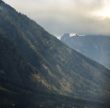 Motorised glider flying over the Alps, Salzburg, Alps, Austria, Europe, aerial view, birds-eyes