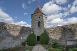 Wall and defensive defence tower of the third largest fortified church in Germany, built from 1461