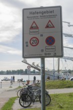 Warning of flood risk in port area, sign, special danger area, stopping ban, speed limit, 20 km/h