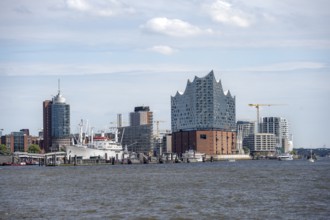 View across the Elbe to modern HafenCity buildings, Elbphilharmonie and Columbushaus, Hamburg,
