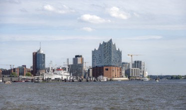View across the Elbe to modern HafenCity buildings, Elbphilharmonie and Columbushaus, Hamburg,