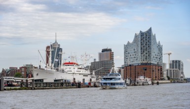 View across the Elbe to modern HafenCity buildings, Elbphilharmonie and Columbushaus, Hamburg,