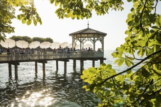 Lake pavilion with bar on the promenade, sunset, Bregenz, Lake Constance, Vorarlberg, Austria