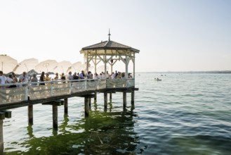 Lake pavilion with bar on the promenade, sunset, Bregenz, Lake Constance, Vorarlberg, Austria