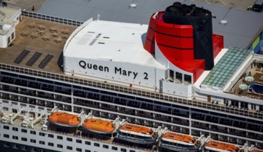 Superstructure with smokestack and lifeboats, cruise terminal, Unilever House cruise ship Queen