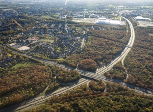 Aerial view, motorway junction Oberhausen, motorway A2, federal road B516, forest area in autumn