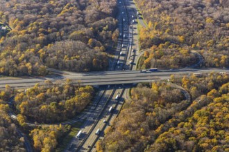 Aerial view, motorway junction Oberhausen, motorway A3, federal road B516, forest area in autumn