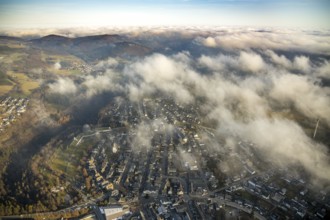 Aerial view, Winterberg centre, Catholic church looking out of the clouds, Oversum Vital Resort,