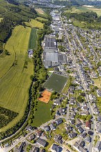 Aerial view, sports ground SSV Elspe, commercial area Elspe, Lennestadt, Sauerland, North