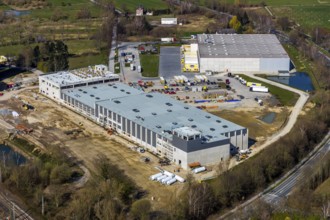 Aerial view, industrial estate northwest, construction site new building logistics hall