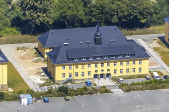 Aerial view, former Kanaal van Wessem barracks, military chapel being restored, Hiddinser Weg,