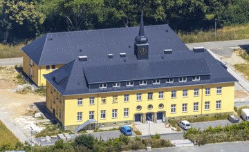 Aerial view, former Kanaal van Wessem barracks, military chapel being restored, Hiddinser Weg,