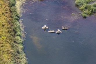 Aerial view, former sewage sludge landfill, concrete parts in pond, Menden, Sauerland, Märkischer