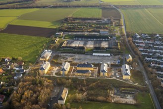 Aerial view, construction area former Kanaal van Wessem barracks, housing estate and refugee