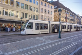 Impression with tram seen in Freiburg im Breisgau, a city in southern Germany at winter time