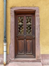 Ornamented door seen in Kaysersberg, a historical town and former commune in Alsace in northeastern