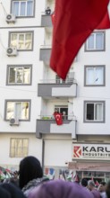 Gaziantep, Türkiye – October 11, 2025: People watch and show support from their balconies as