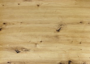 A full frame brown wood grain surface