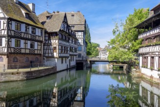 Sunny waterside impression of Strasbourg, a city at the Alsace region in France