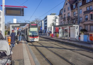 Impression with tramway in Freiburg im Breisgau, a city in southern Germany at winter time