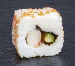 Sushi dish on dark grey stone surface