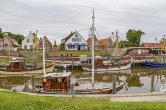 Idyllic port scenery in Greetsiel, a idyllic village located in East Frisia, Northern Germany