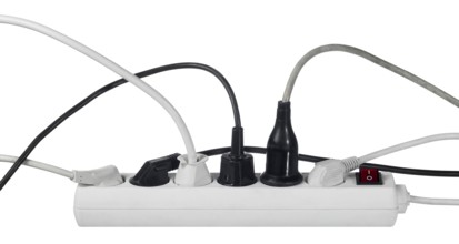 Studio photography of a multiple socket and connected plugs isolated on white with clipping path