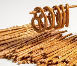 Closeup of some salt sticks and pretzels in light back
