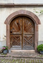 Historic door seen in Kaysersberg, a historical town and former commune in Alsace in northeastern