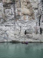Scenery with rowboat and rock formation at River Shennong Xi in China
