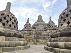 Lots of stupas at a temple named Borobudur located in Java, a island of Indonesia