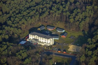 HALTERN AM SEE 16.12.2020 Aerial view of the DJH youth hostel Haltern am See in the wooded area at