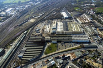 Aerial view, construction site on the WDI site between the railway embankment and