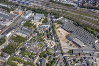 Aerial view, construction site on the WDI site between the railway embankment and