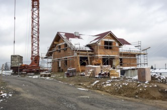 House construction scenery at winter time