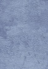 A full frame abstract blue leather background