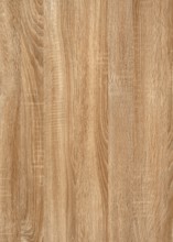 A full frame brown wood grain surface