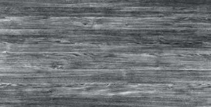 A full frame grey wood grain surface