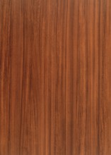 A full frame red brown wood grain surface