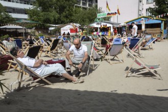 DEU Germany Germany Berlin Beach with bars and stalls on an undeveloped site not far from