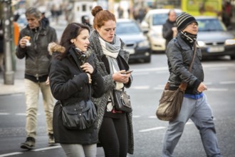 DEU Germany Germany Berlin Smartphone users in public