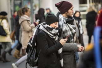 DEU Germany Germany Berlin Smartphone users in public