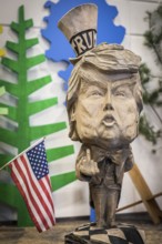DEU Germany Germany Berlin The bust of US President Donald Trump, made by a chainsaw artist, at the