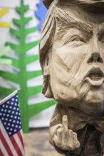 DEU Germany Germany Berlin The bust of US President Donald Trump, made by a chainsaw artist, at the