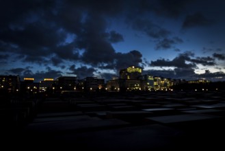 DEU Germany Germany Berlin The Holocaust Memorial at blue hour under a cloudy sky in the direction